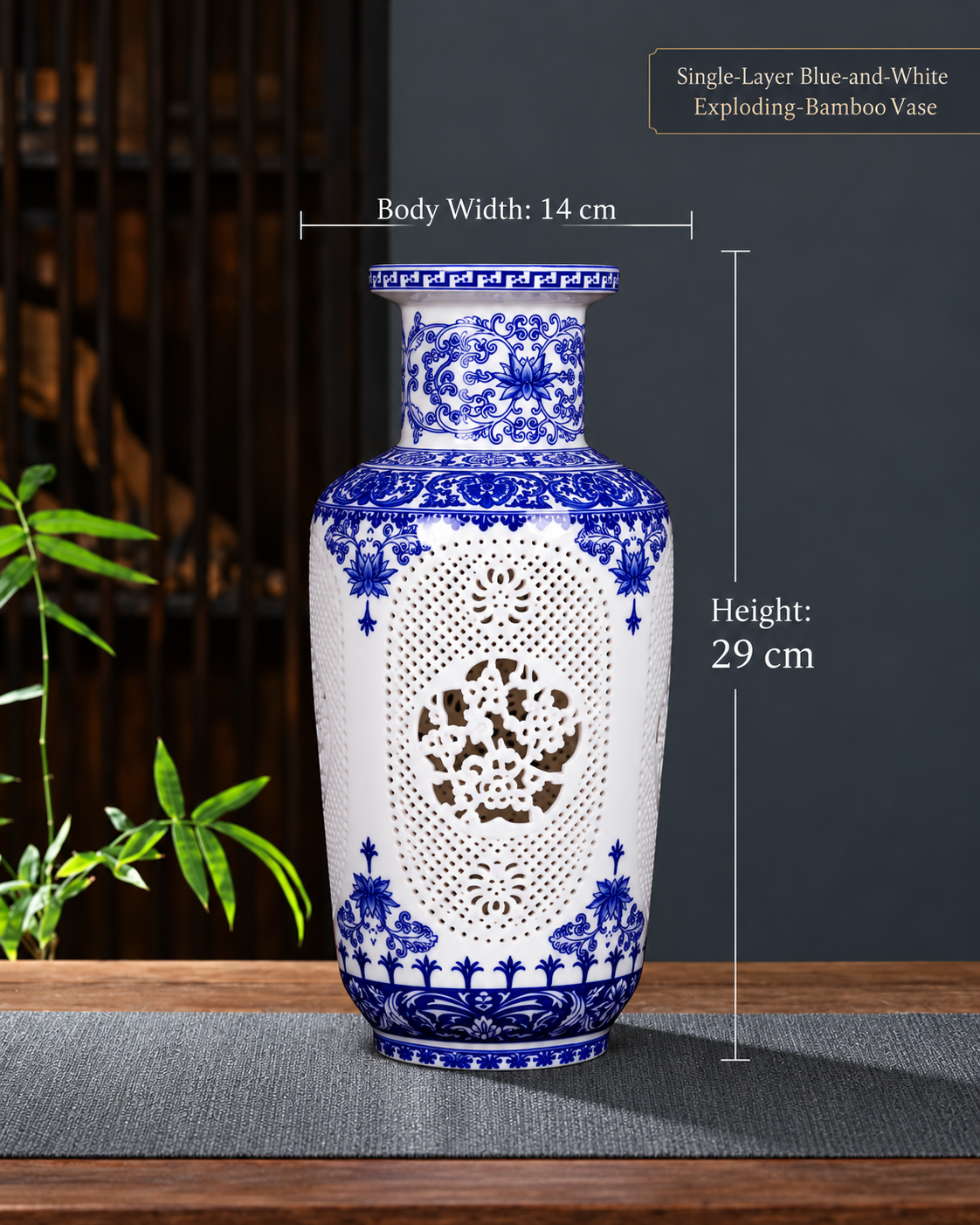 Blue and white openwork cylindrical porcelain vase, 29 cm high and 14 cm wide